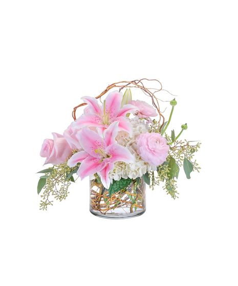 Curly willow encircles this combination of hydrangea, roses, lilies and ranunculus to draw attention to the premium delicate blooms in a clear glass cylinder