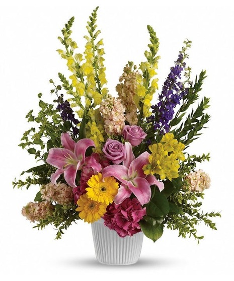 arrangement of pink hydrangea, lavender roses, pink lilies and other favorites