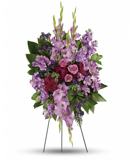 A spray of lavender roses, alstroemeria and gladioli.